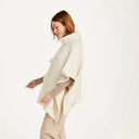 A10086 NATURAL WHITE Colour Supersoft Merino Cowl Neck Aran Poncho Side View Gaelsong