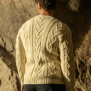 A20229 Men's Merino Wool Button-Up Irish Cardigan Natural White Lifestyle Back View Gaelsong
