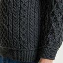 
A20289 CHARCOAL Colour Supersoft Merino Turtleneck Aran Sweater Studio Clsoeup Knit Sleeve View Gaelsong

