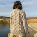 A20294 Ladies Heavyweight Aran Fisherman Sweater Parsnip Color Back View Lifestyle Gaelsong
