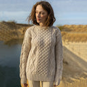 A20294 Ladies Heavyweight Aran Fisherman Sweater Parsnip Color Front Lifestyle Gaelsong
