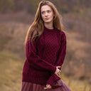 A20294 Ladies Heavyweight Aran Fisherman Sweater Wine Color Lifestyle Gaelsong
