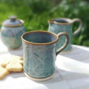 D63052 Oilean Irish Pottery Mug Lifestyle Gaelsong