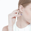 J13805 Thistle Designed Drop Earrings with Gemstone Purple Color Lifestyle Gaelsong