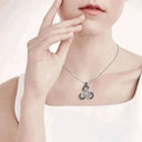 Celtic Triskele Pendant with Gold Accents Lifestyle Gaelsong
